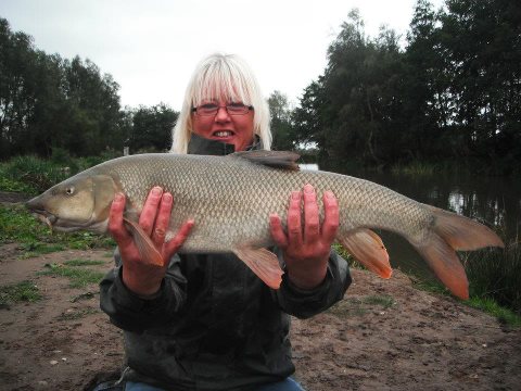 Sharon Bradley with a 14lb 8oz Barbel from Heronbrook Fisheries North Staffs - Nice one Sharon!